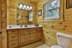 King Master bath with double vanities and shower/tub combo